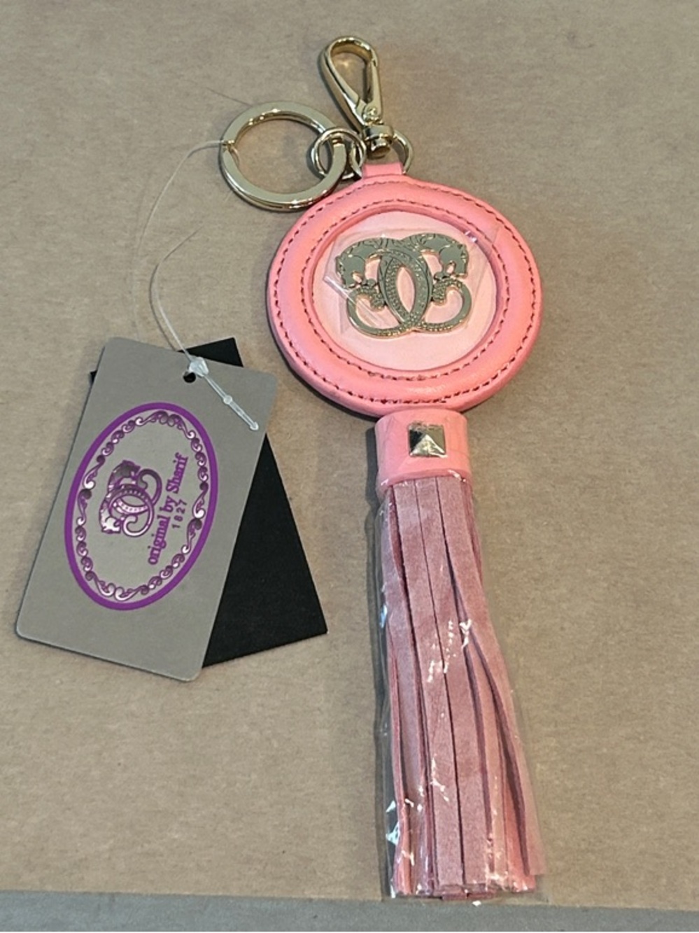 Sharif Pink Tassel Keychain Bag Charm with Logo Accent